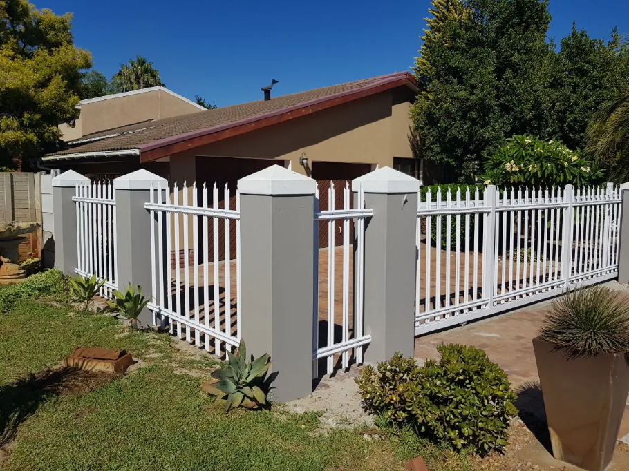📸 white w-shaped palisade panels installed at residential driveway in South Africa